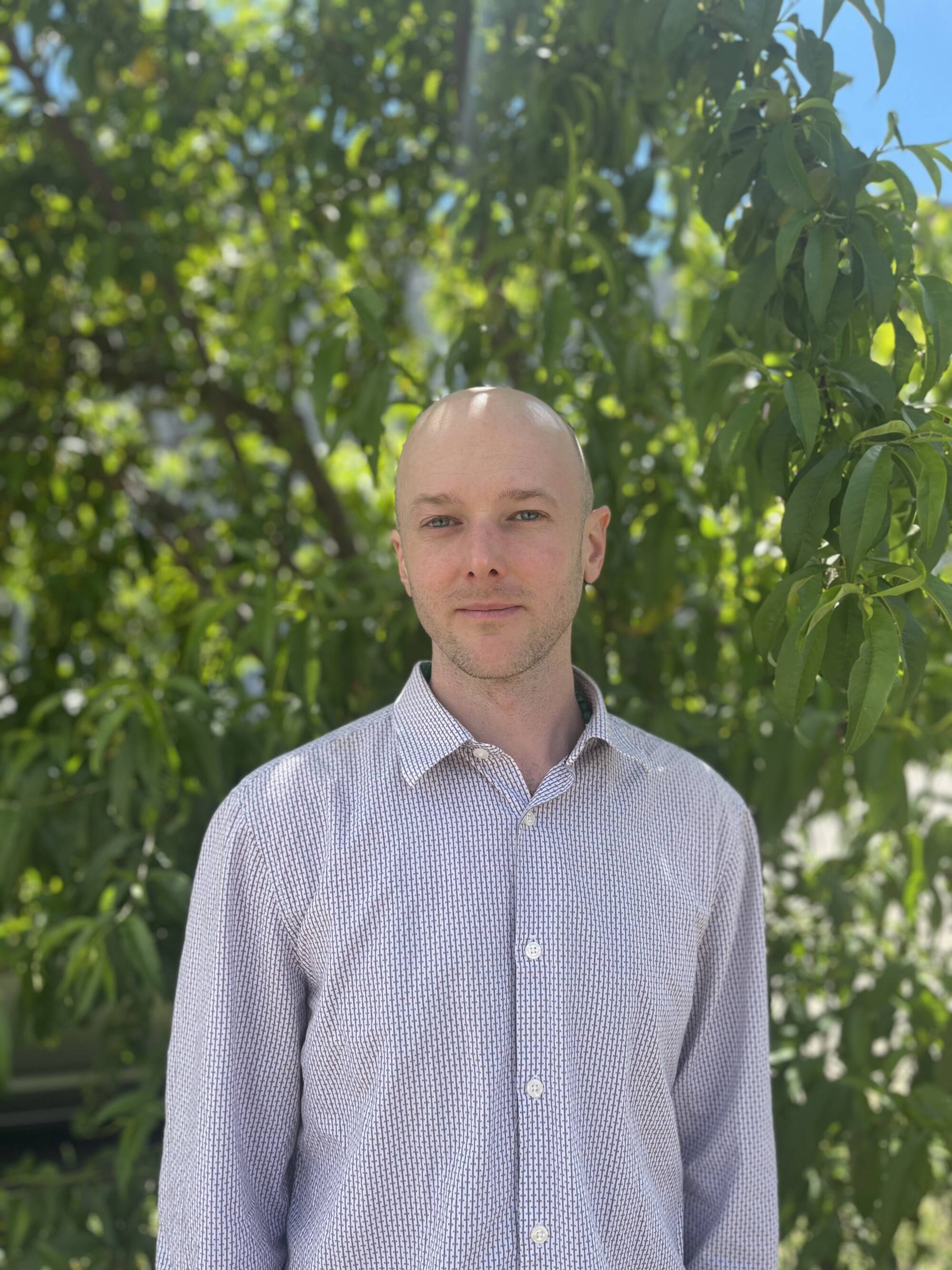 headshot of visarts teacher Caleb Flood