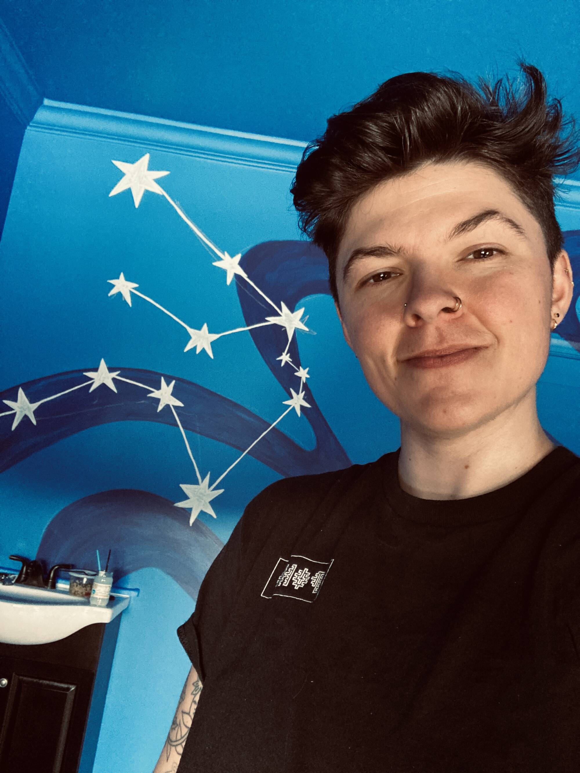 headshot of visarts teacher Sam Skrimpz