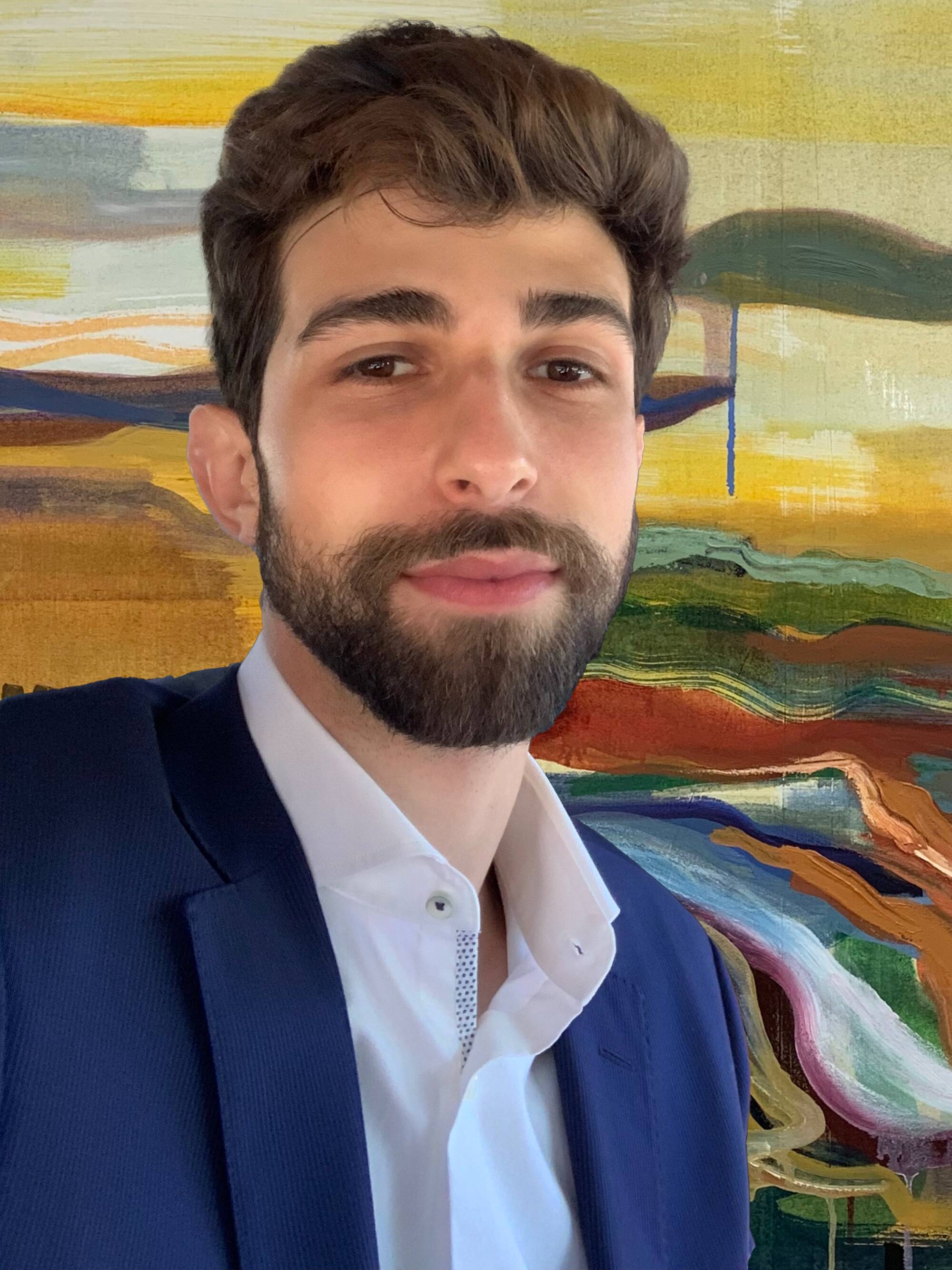 headshot of visarts teacher William Okaily